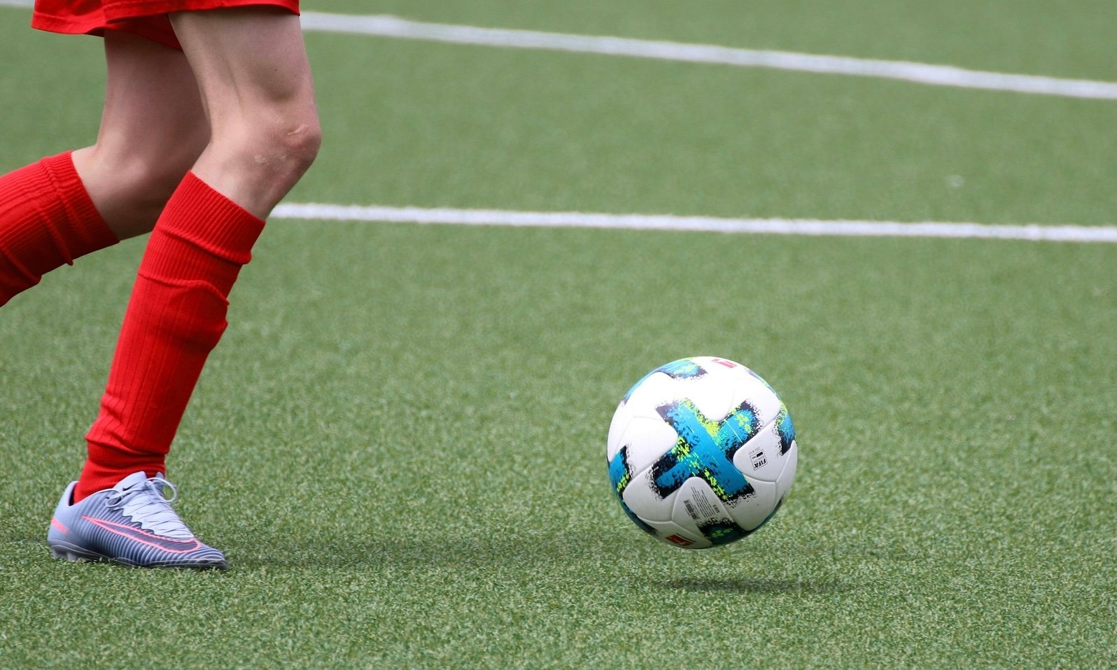 Artificial turf for soccer pitch static scene